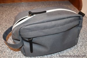 Rectangular shaped canvas toiletry bag with zip top and zipper pocket on front for DIY First Aid Kit