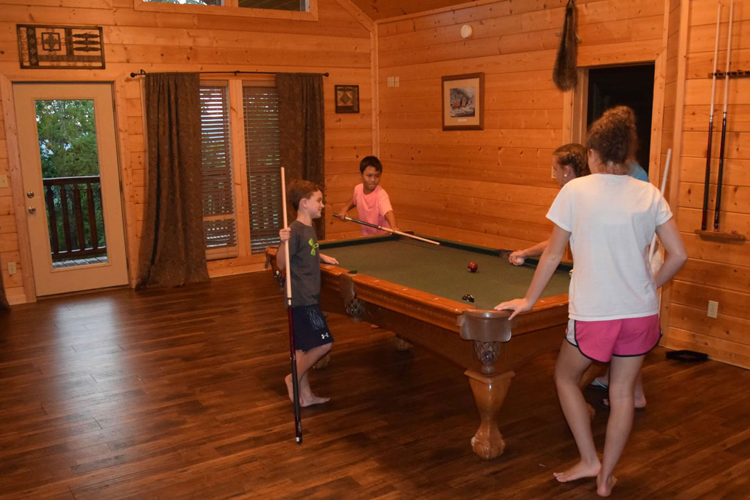 Pool table in a game room