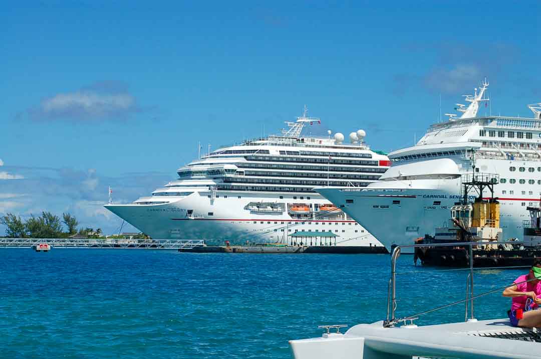 front ends of two cruise ships at port in Nassau Bahamas