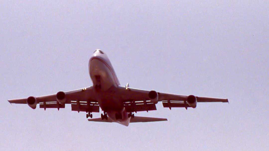 photo of TWA 747 just prior to landing with flaps and wheels down