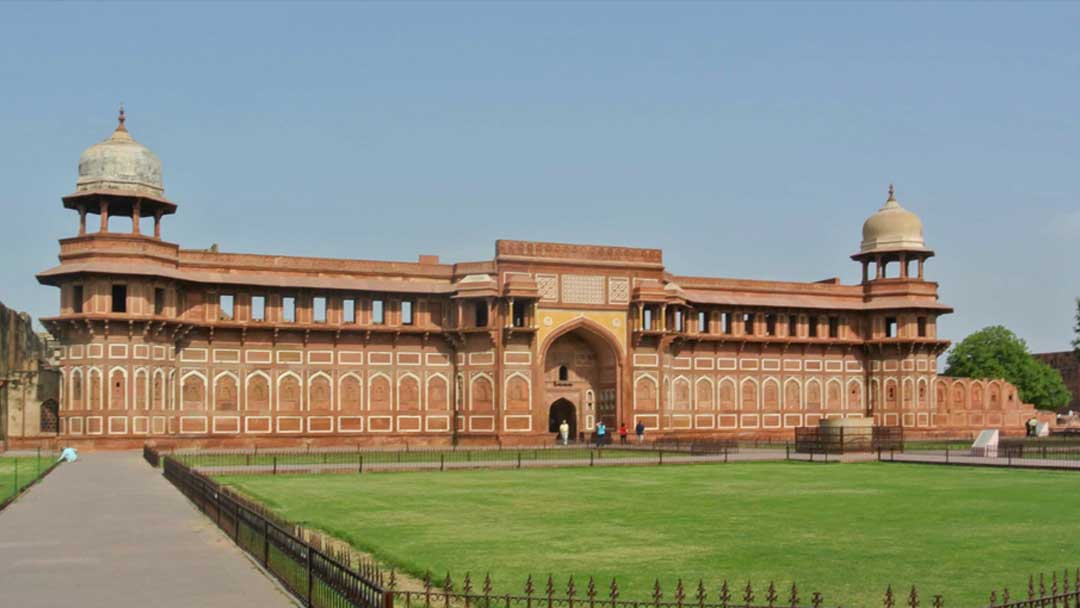 Interior building of the Agra Fort. Red sandstone building with white stone trim and decoration.