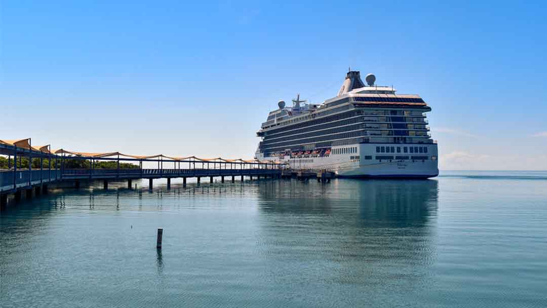 Photo of cruise ship at end of pier
