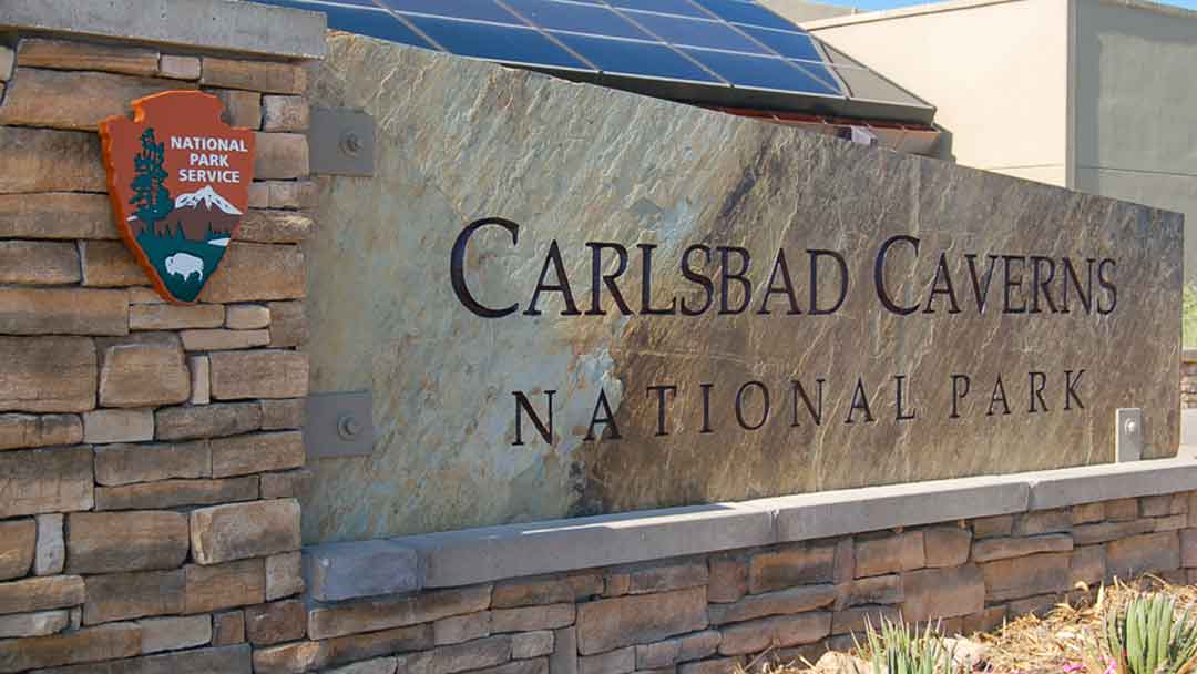 National Park Service shield on sign for Carlsbad Caverns